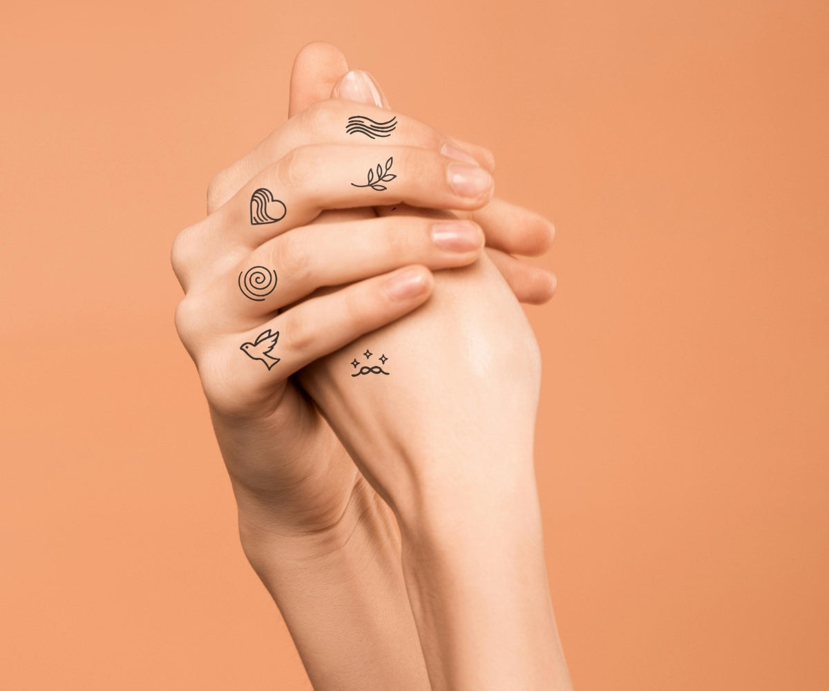 Lustige Finger Tattoos