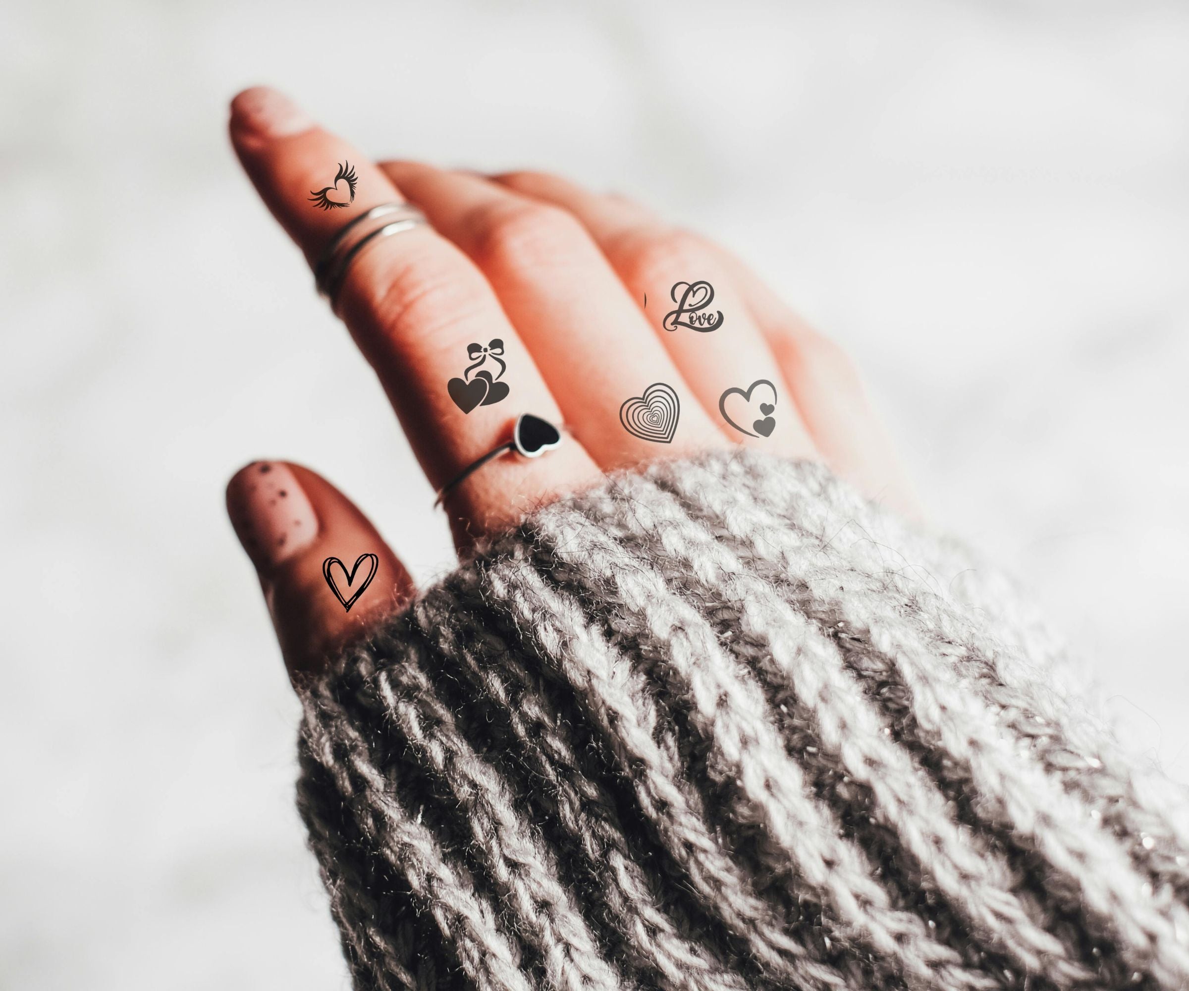 Herz Finger Tattoos