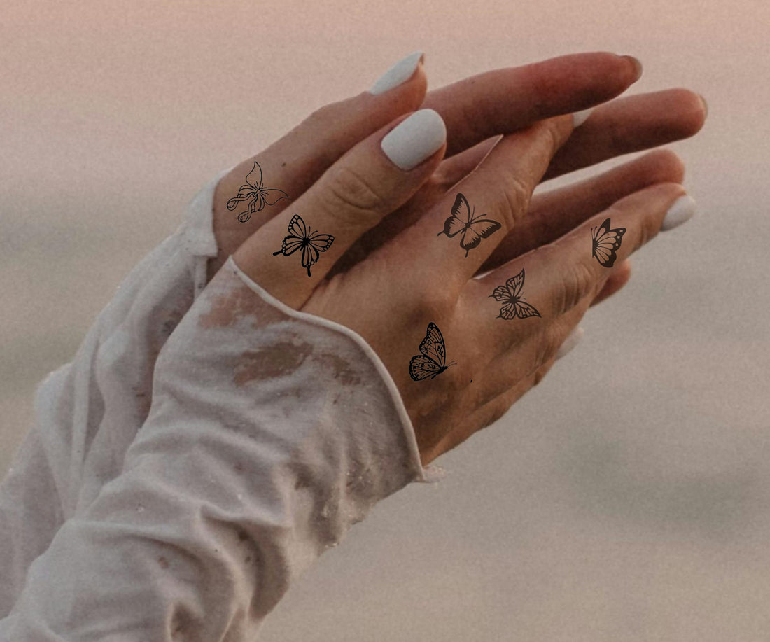 Schmetterling Finger Tattoos